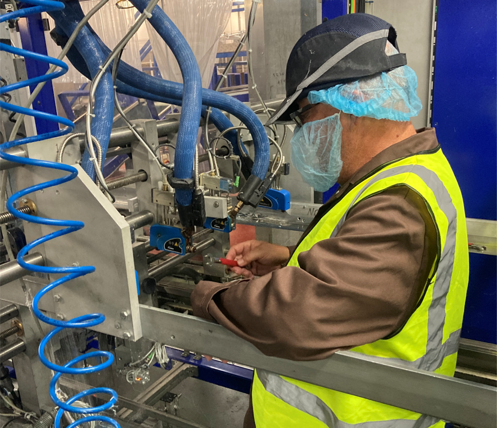 igluetech engineer servicing Nordson Mini Blue 2